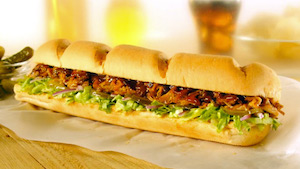 Illustration for article titled Fast-Food Fight: Subway's Pulled Pork Vs. Wendy's Pretzel Bacon Burger